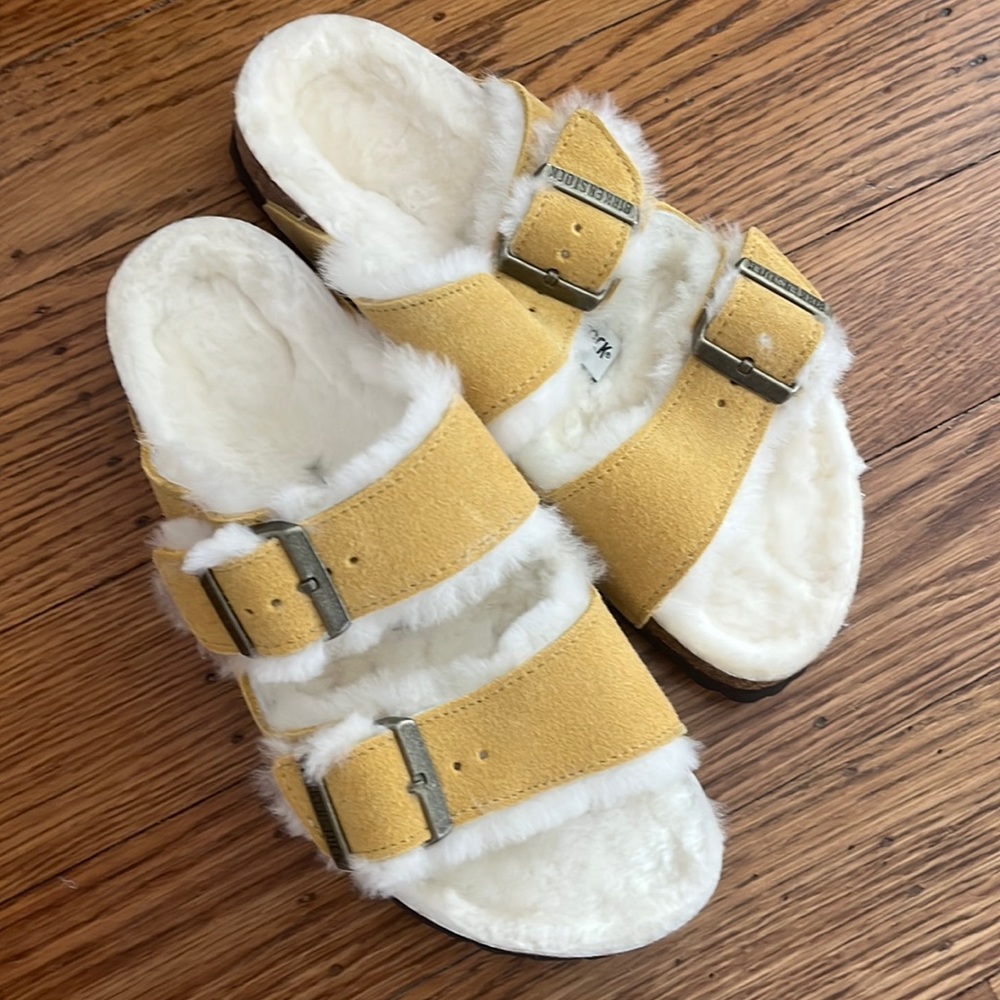 Birkenstock 38 mustard shearling sandals.